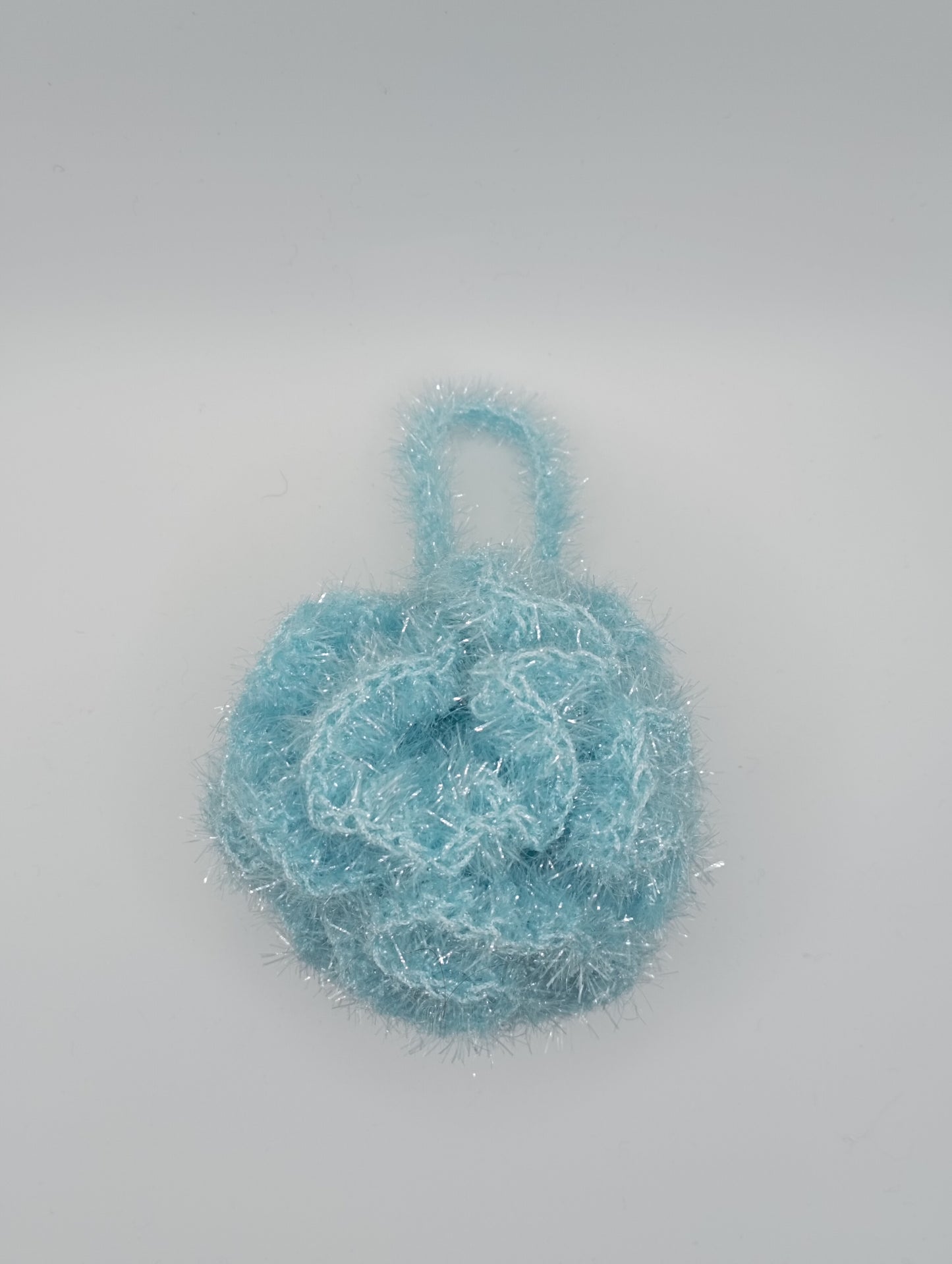 Fleur de douche exfoliante